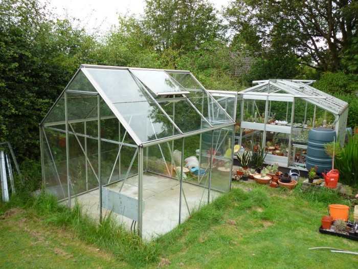 I started with 2 greenhouses, the one on the left was 6x7ft and the one at the back was 10x12ft. The smaller greenhouse was emptied first and dismantled. This all started in October 2011
