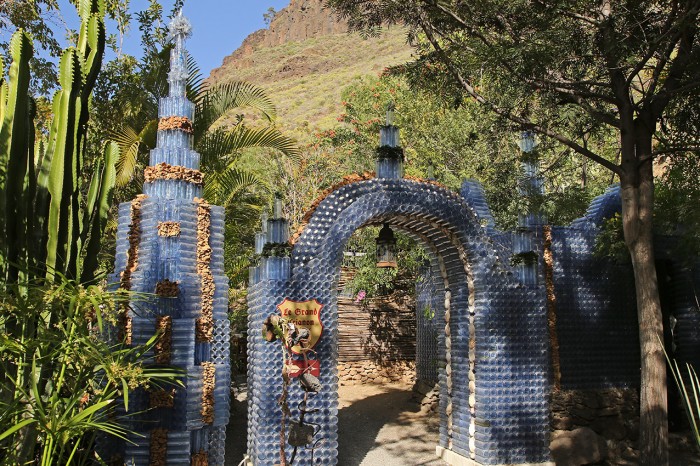An extraordinary bit of artwork made from plastic bottles in the same garden